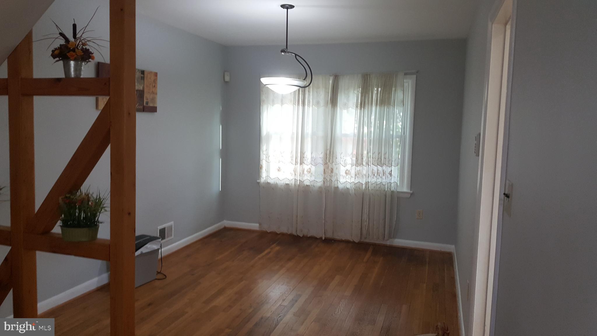 6216 Stoneham Road Bethesda, MD 20817 - Photo 12 of 41 Hardwood floor in Dining room