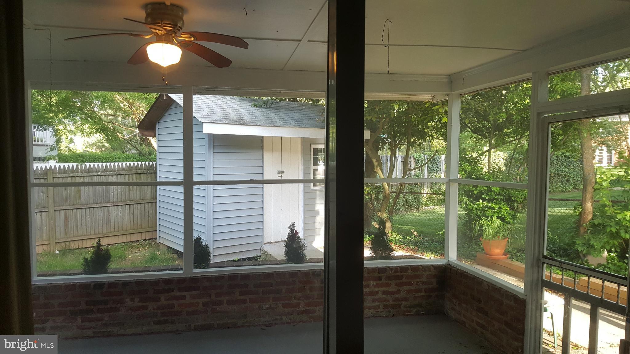 6216 Stoneham Road Bethesda, MD 20817 - Photo 18 of 41 Covered screened patio
