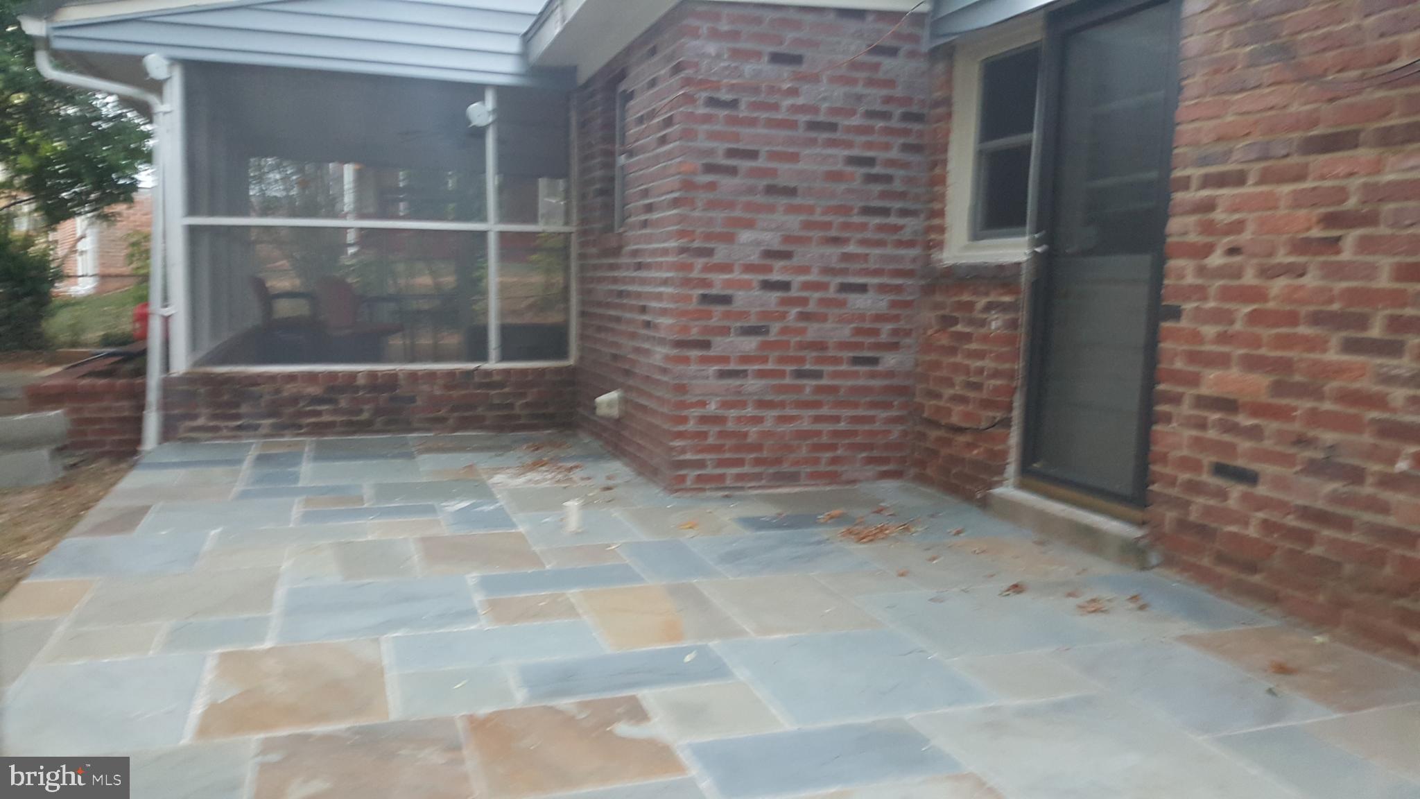 6216 Stoneham Road Bethesda, MD 20817 - Photo 20 of 41 Raised flagstone patio