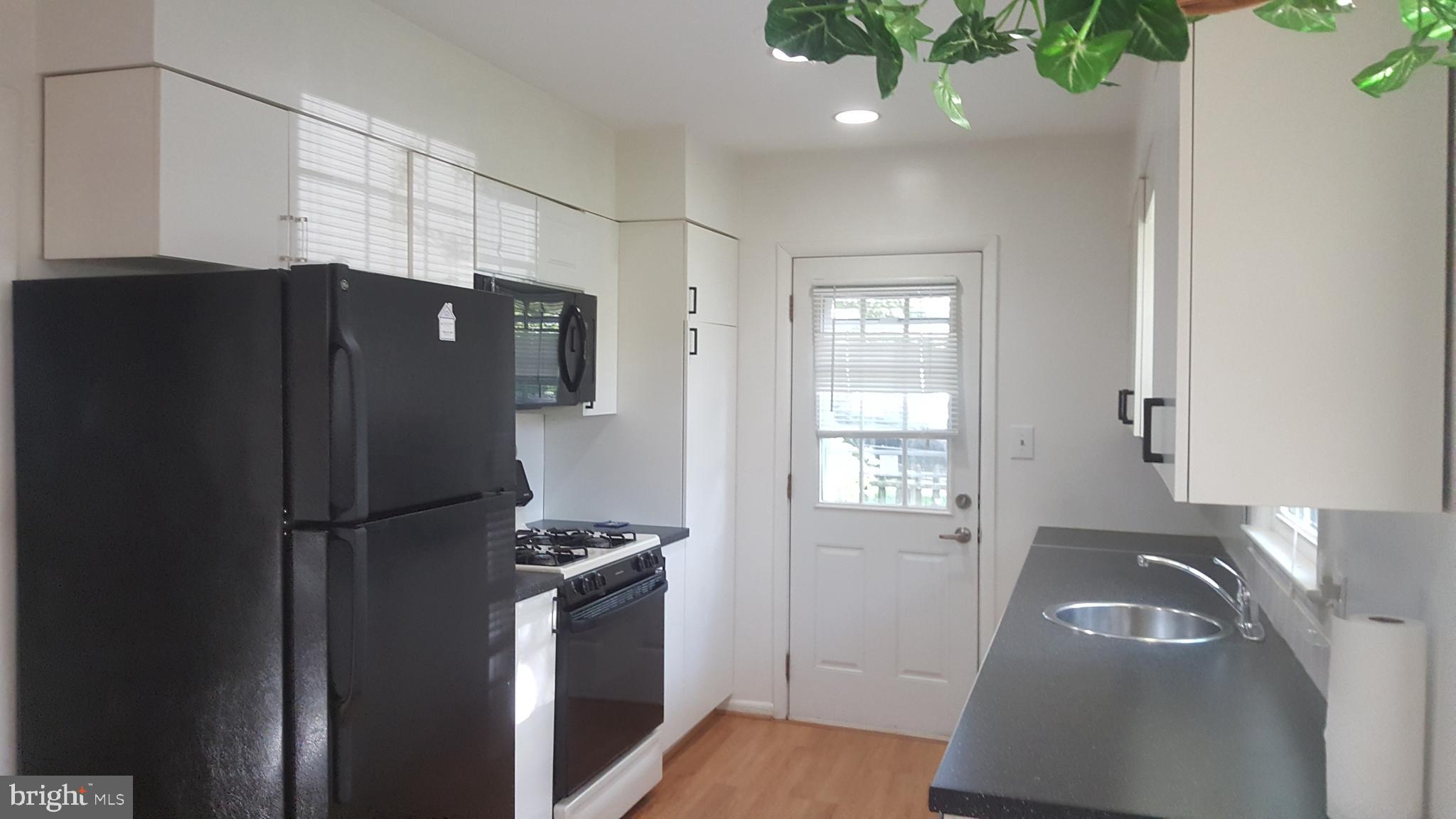 6216 Stoneham Road Bethesda, MD 20817 - Photo 9 of 41 Kitchen with plenty of natural light