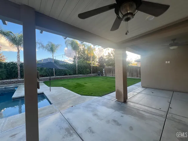 a view of a yard and entertaining space