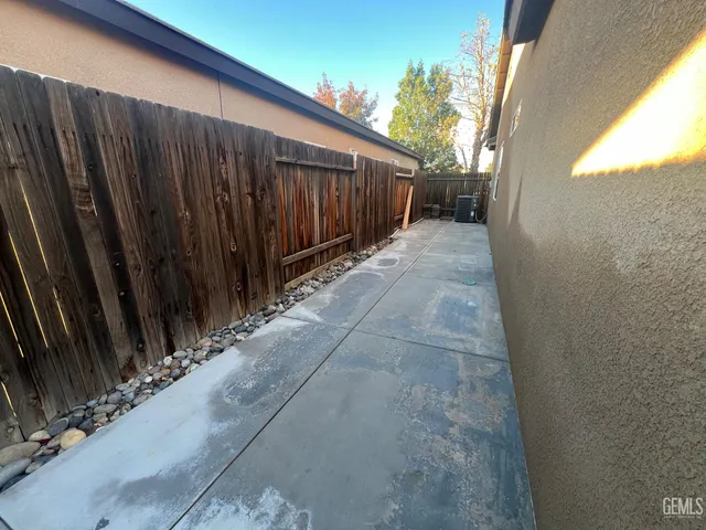 a view of a backyard of the house