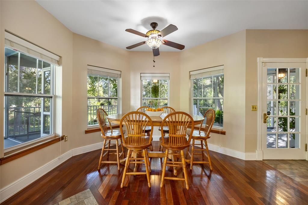 37810 Boyd Road Myakka City, FL 34251 - Photo 24 of 98 a view of a dining room with furniture window and wooden floor