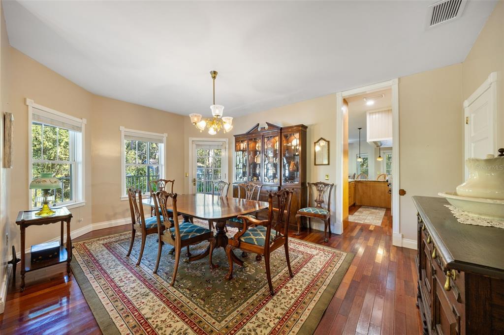 37810 Boyd Road Myakka City, FL 34251 - Photo 3 of 98 a view of a dining room with furniture window and wooden floor