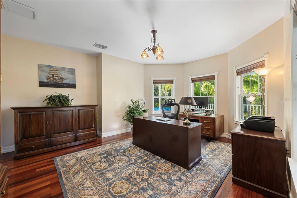 37810 Boyd Road Myakka City, FL 34251 - Photo 34 of 98 a living room with furniture a window and wooden floor