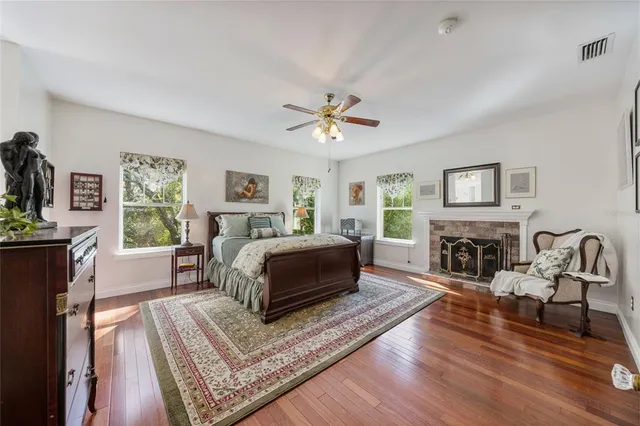 a view of a backyard with sitting area