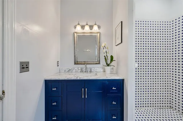a view of a chairs and table in backyard