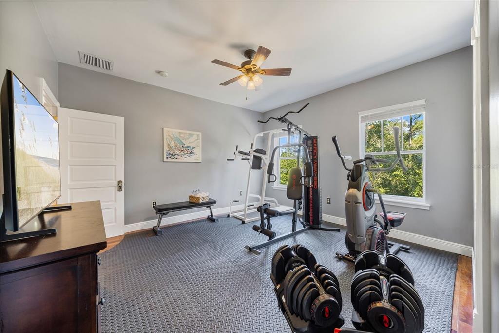 37810 Boyd Road Myakka City, FL 34251 - Photo 50 of 98 a view of a livingroom with furniture and a flat screen tv