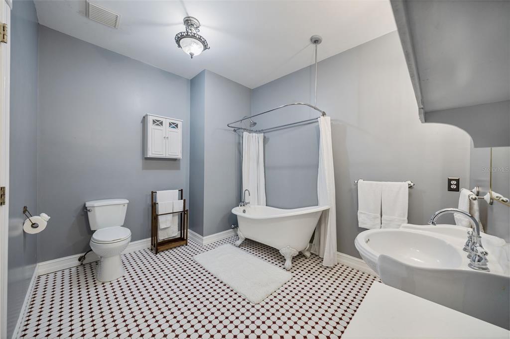 37810 Boyd Road Myakka City, FL 34251 - Photo 53 of 98 a bathroom with a sink a toilet and a mirror