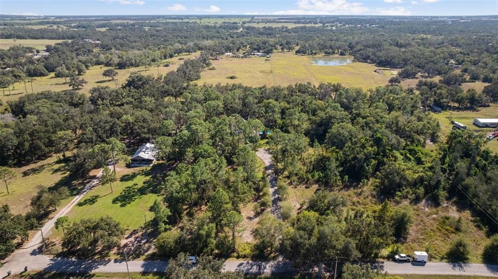 37810 Boyd Road Myakka City, FL 34251 - Photo 84 of 98 an aerial view of beach and residential houses with outdoor space