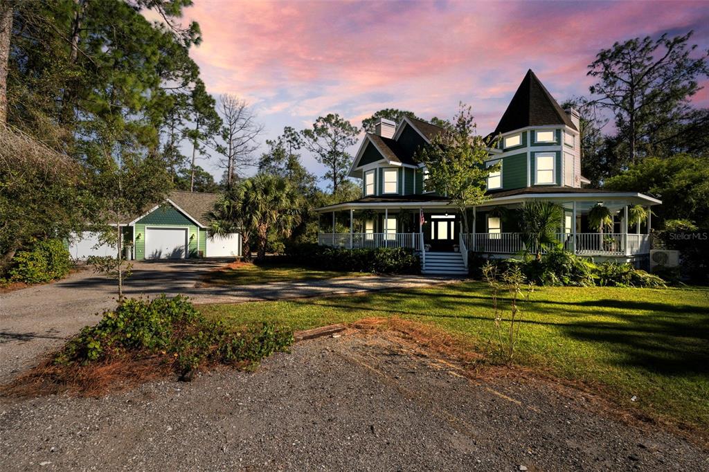 37810 Boyd Road Myakka City, FL 34251 - Photo 10 of 98 a front view of a house with swimming pool having outdoor seating