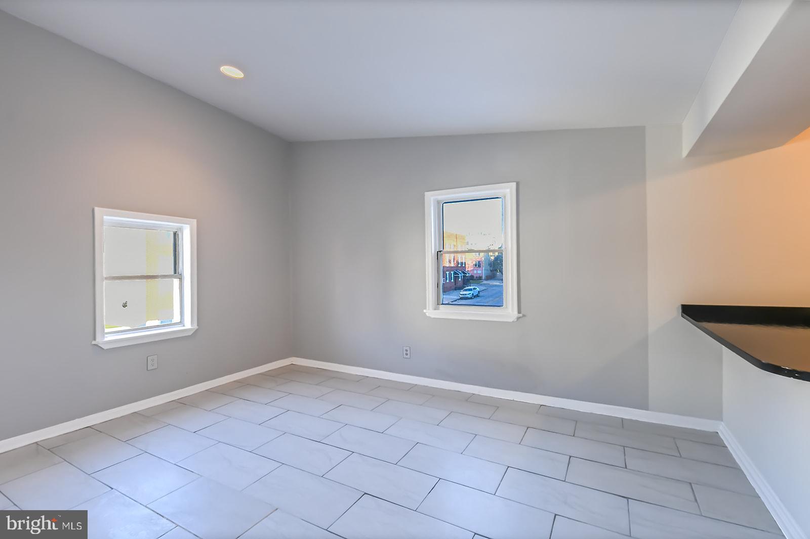 1436 West Baltimore Street, Unit 2 Baltimore, MD 21223 - Photo 4 of 11 a view of an empty room with a window