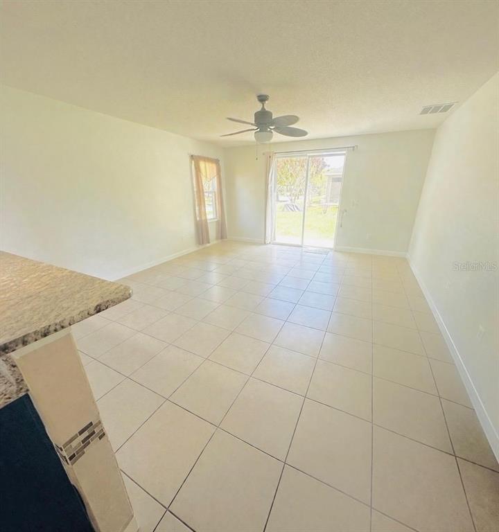 1901 Nations Way St. Cloud, FL 34769 - Photo 13 of 17 a view of an empty room with a window