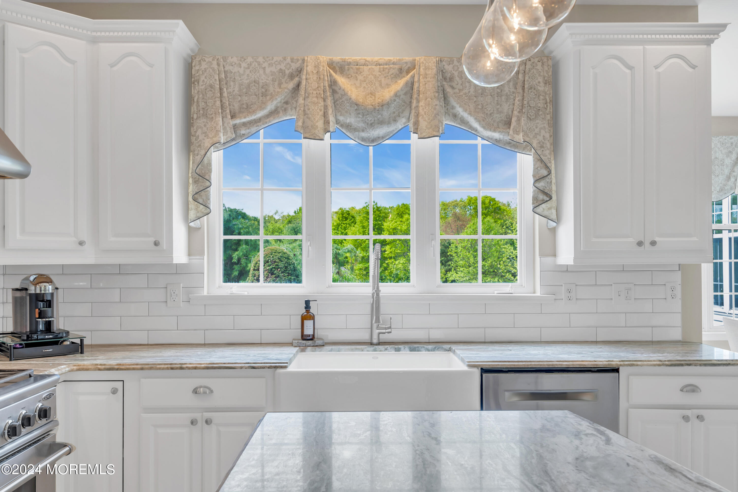 12 Rodeo Drive Jackson, NJ 08527 - Photo 15 of 114 a kitchen with stainless steel appliances granite countertop a sink and a window