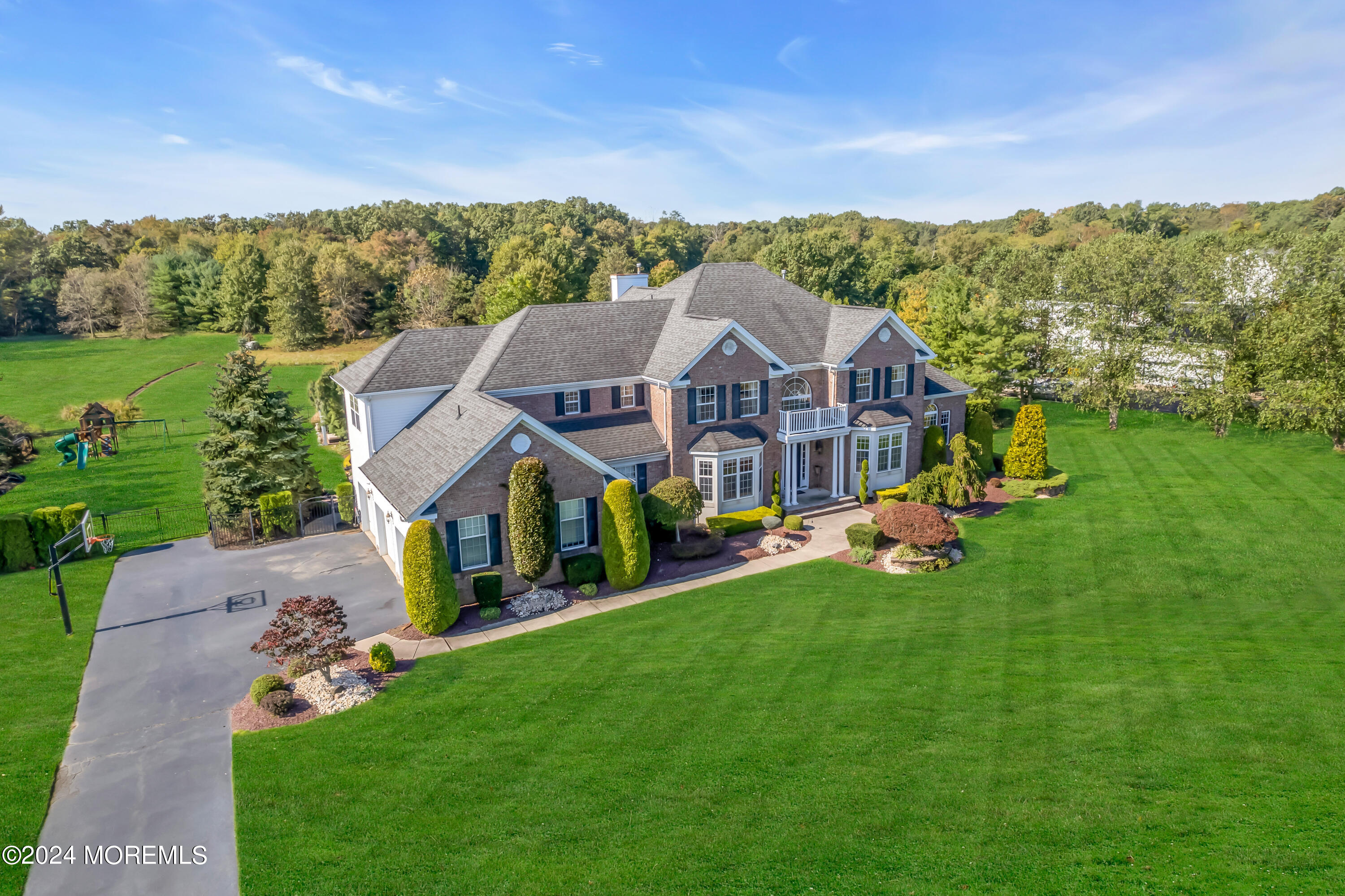 12 Rodeo Drive Jackson, NJ 08527 - Photo 85 of 114 a view of a house with a big yard and large trees