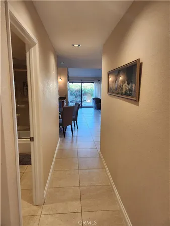 a lobby with furniture and a window