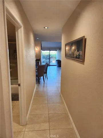 a lobby with furniture and a window