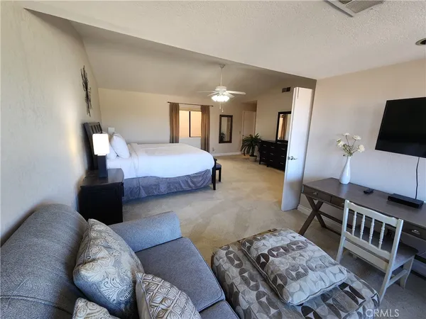 a living room with furniture and a couch