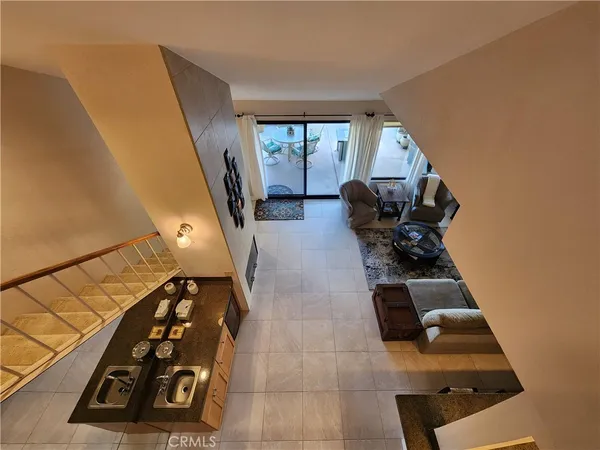 a view of entryway with workspace and window