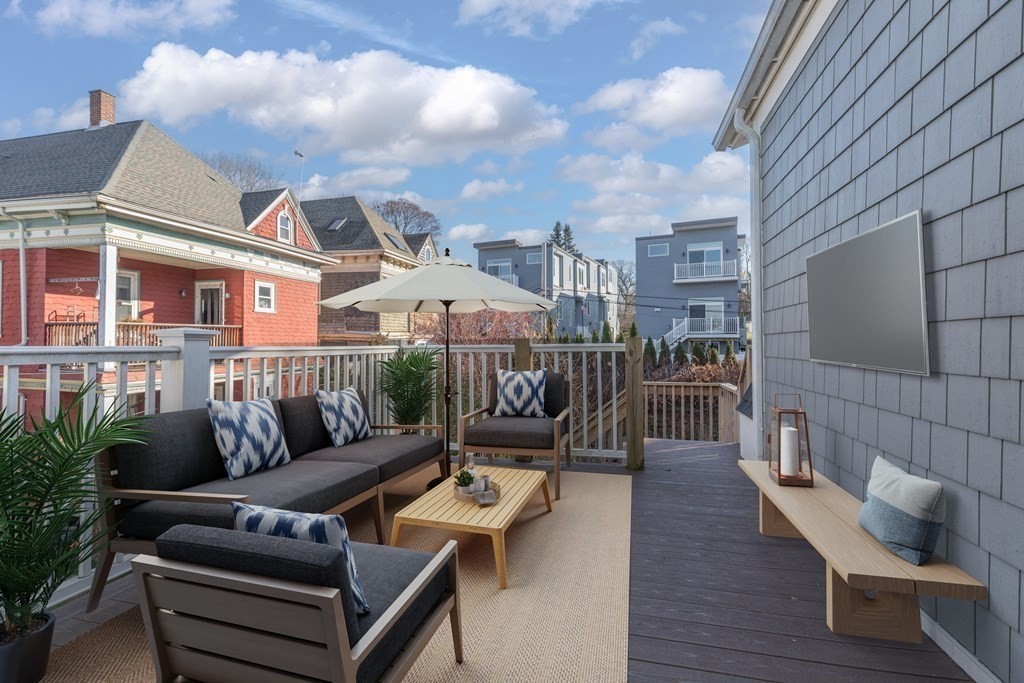 41 Wenham Street, Unit 3 Boston, MA 02130 - Photo 11 of 13 a view of a terrace with furniture