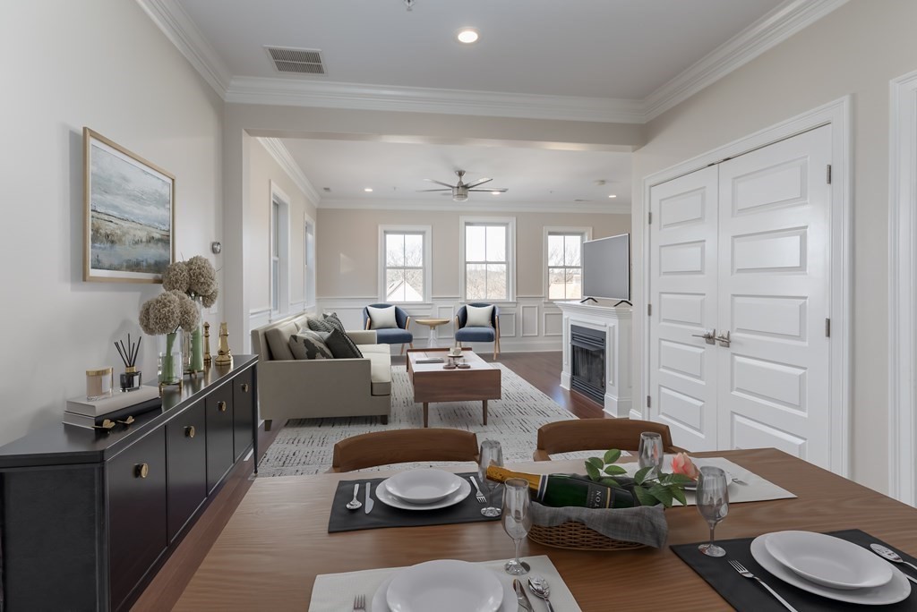 41 Wenham Street, Unit 3 Boston, MA 02130 - Photo 2 of 13 a living room with furniture and a wooden floor