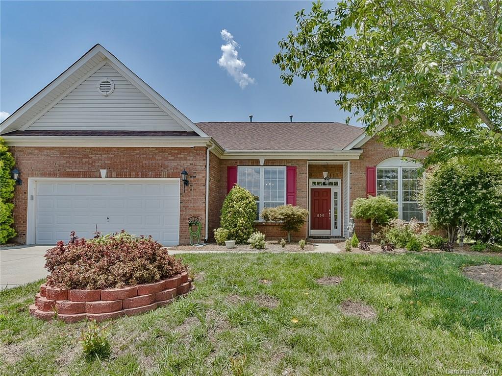 850 Platinum Drive Fort Mill, SC 29708 - Photo 1 of 47 a front view of a house with a yard