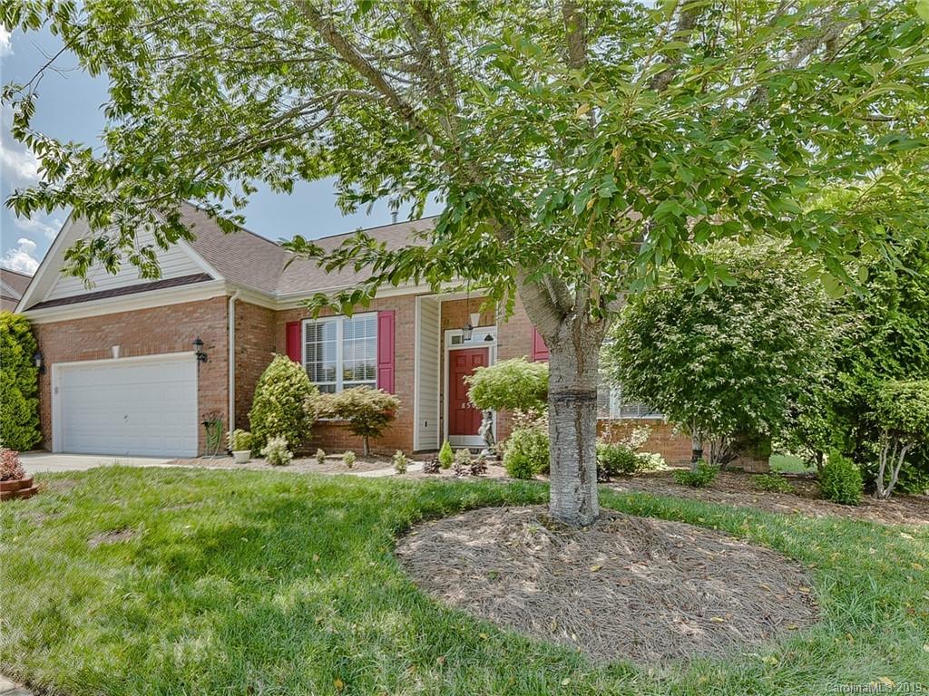 850 Platinum Drive Fort Mill, SC 29708 - Photo 2 of 47 a front view of a house with a yard and trees