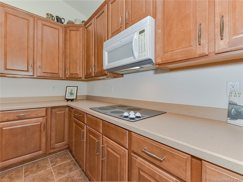 850 Platinum Drive Fort Mill, SC 29708 - Photo 26 of 47 a kitchen with granite countertop cabinets stainless steel appliances a sink and dishwasher