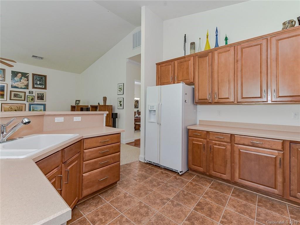 850 Platinum Drive Fort Mill, SC 29708 - Photo 27 of 47 a kitchen with stainless steel appliances granite countertop a refrigerator and a stove top oven