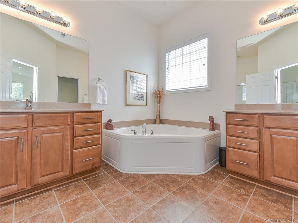 850 Platinum Drive Fort Mill, SC 29708 - Photo 37 of 47 a spacious bathroom with a bathtub and a sink
