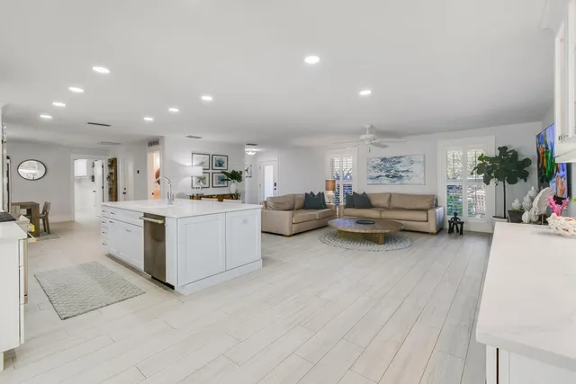 a kitchen with a table and chairs in it
