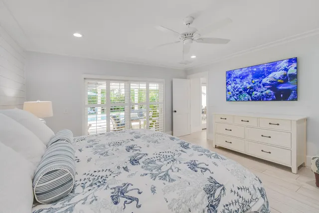 a bathroom with a shower sink and mirror