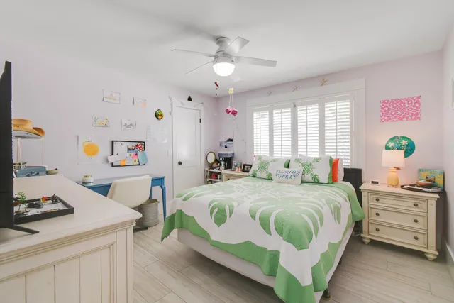 a white refrigerator freezer sitting inside of a kitchen