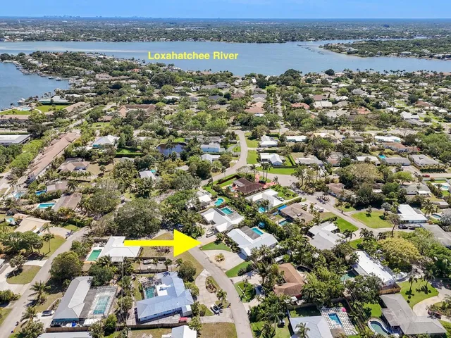 a kitchen with cabinets and window