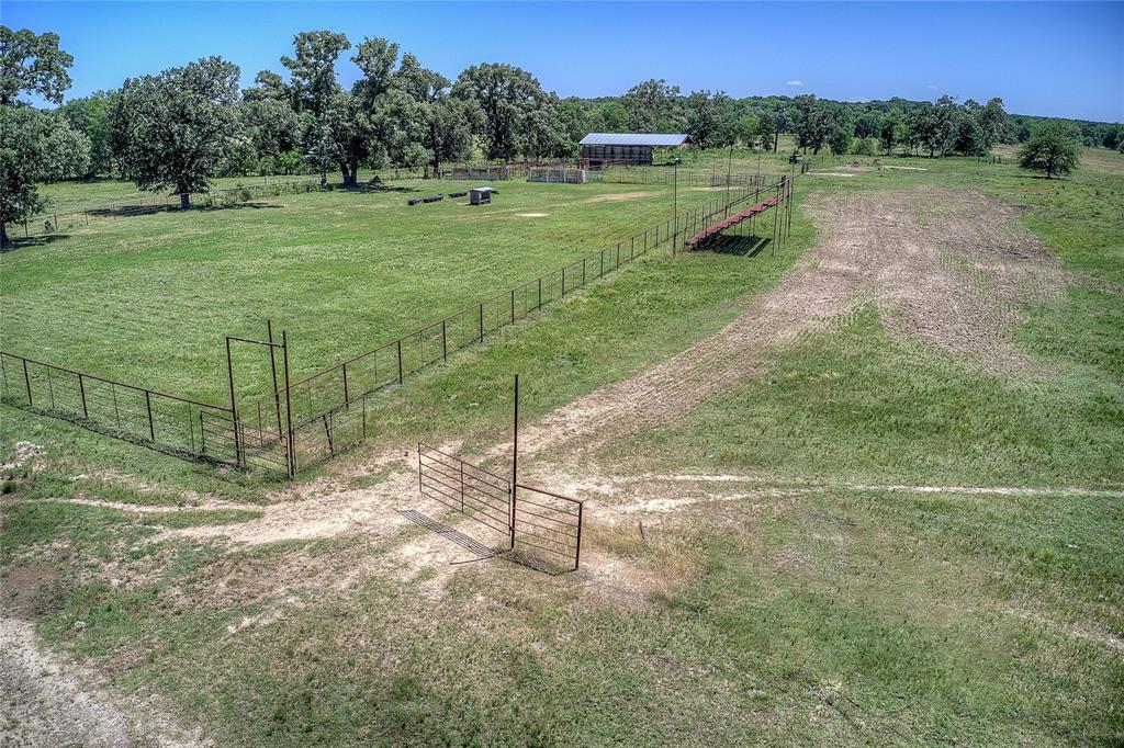 3296 Farm Road 3236 Dike, TX 75437 - Photo 27 of 40 a view of an outdoor space and a yard