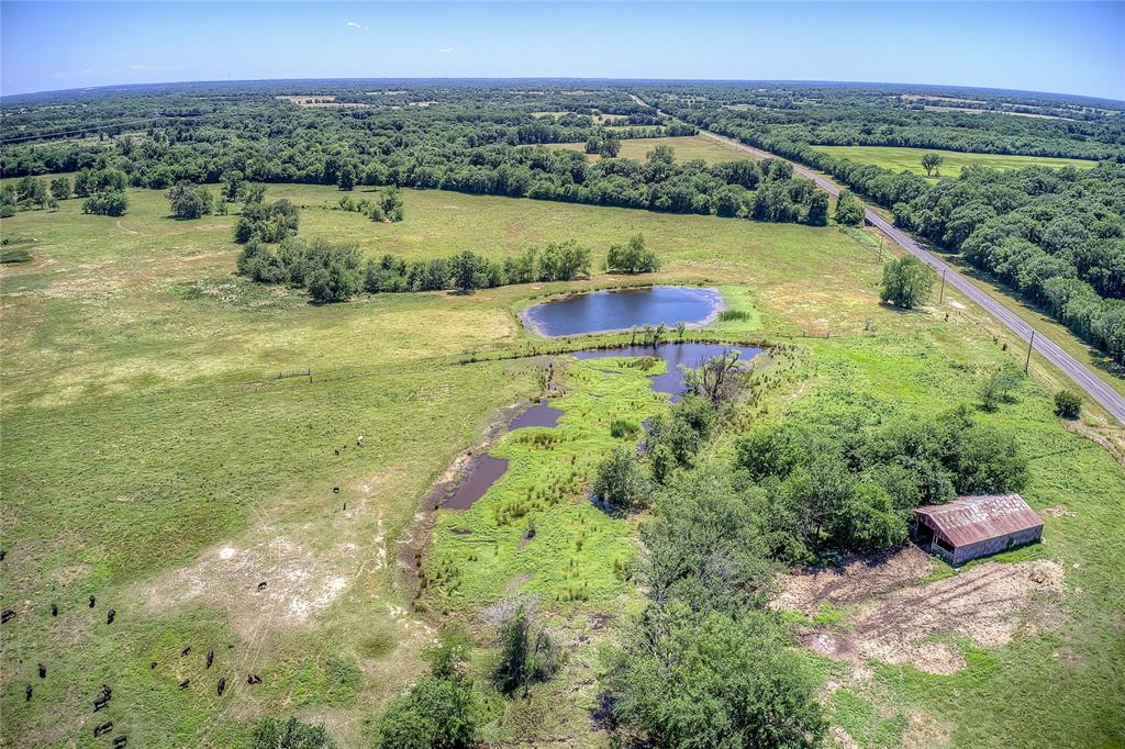 3296 Farm Road 3236 Dike, TX 75437 - Photo 38 of 40 a view of a lake with a city