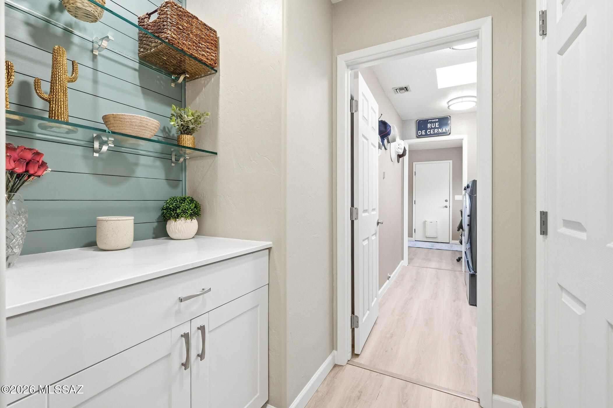13599 East Rincon Ranch Road Vail, AZ 85641 - Photo 20 of 41 a bathroom with a sink and a mirror