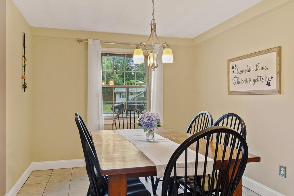 10 Craig Road Chelmsford, MA 01824 - Photo 11 of 34 a view of a dining room with furniture window and outside view
