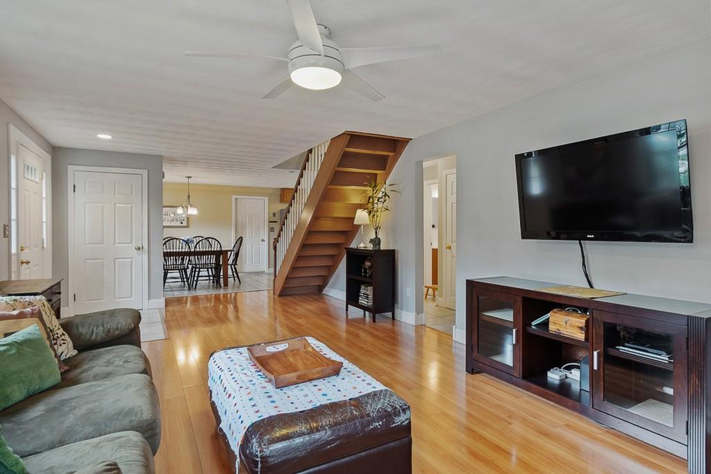 10 Craig Road Chelmsford, MA 01824 - Photo 16 of 34 a living room with furniture and a flat screen tv