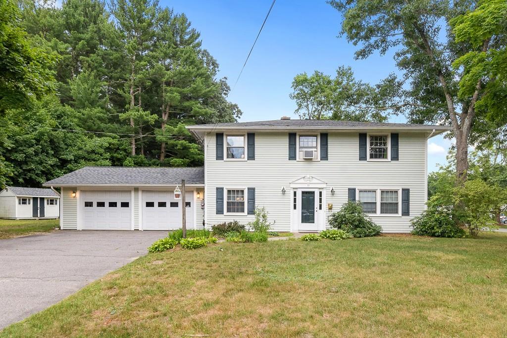 10 Craig Road Chelmsford, MA 01824 - Photo 2 of 34 front view of a house with a yard