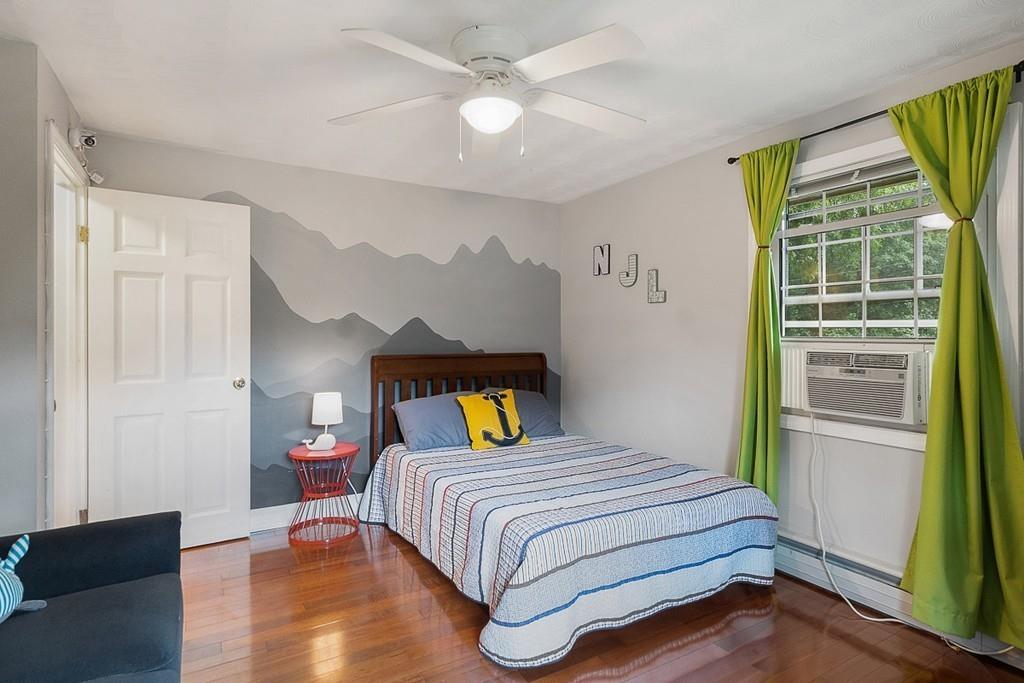 10 Craig Road Chelmsford, MA 01824 - Photo 23 of 34 a bedroom with a bed and a large window