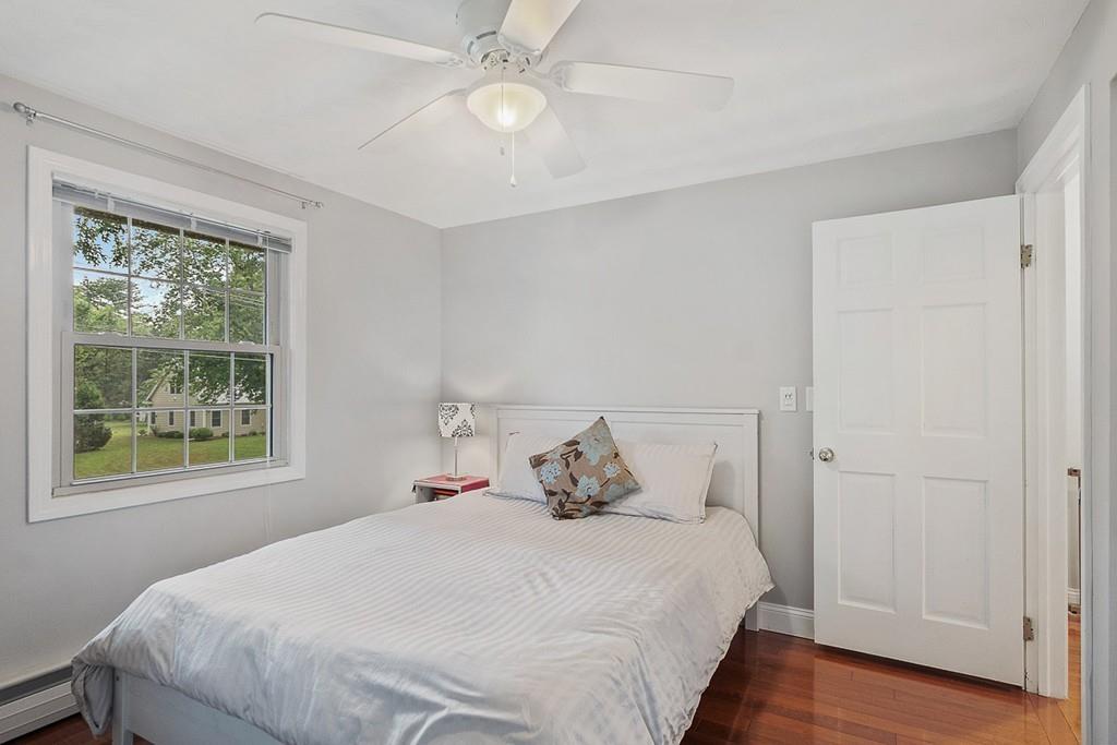 10 Craig Road Chelmsford, MA 01824 - Photo 26 of 34 a bedroom with a large bed and a window