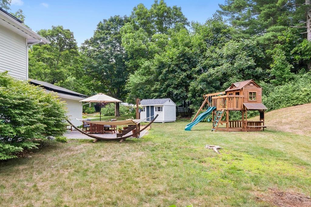 10 Craig Road Chelmsford, MA 01824 - Photo 5 of 34 an aerial view of a house with swimming pool and deck