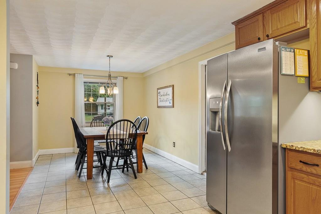 10 Craig Road Chelmsford, MA 01824 - Photo 10 of 34 a view of a dining room with furniture
