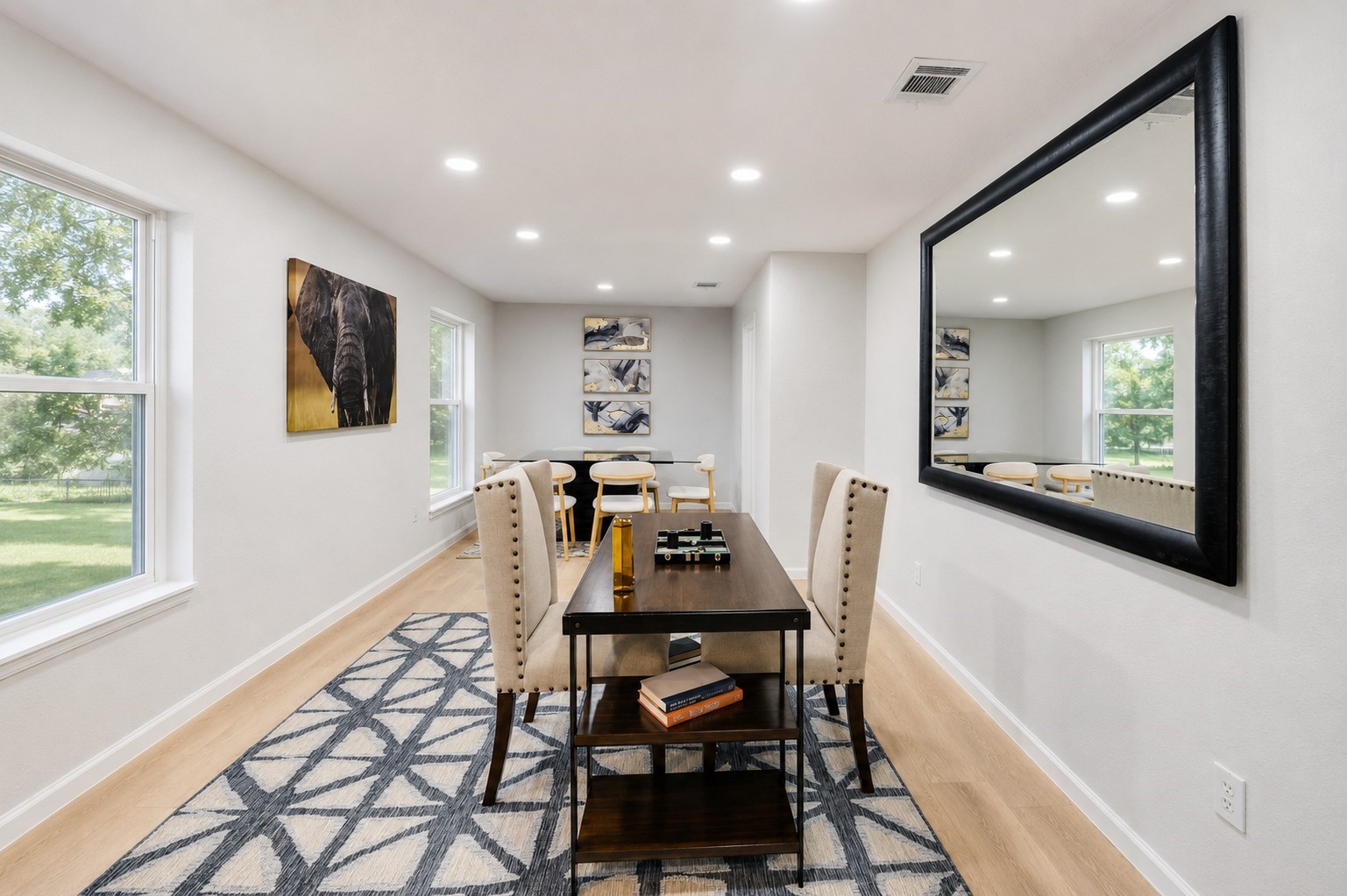 12703 Redfern Drive Houston, TX 77048 - Photo 9 of 28 The elongated layout, recessed lighting, and neutral finishes create endless possibilities for customization to fit your lifestyle needs.