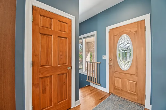 a view of a hallway with windows
