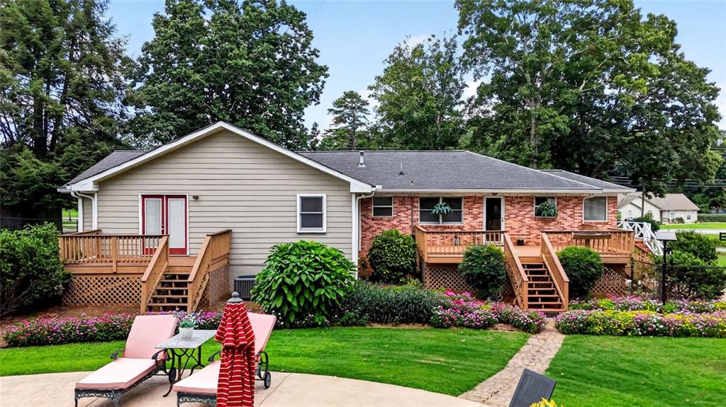 615 Tanner Road Dacula, GA 30019 - Photo 55 of 57 a front view of a house with garden