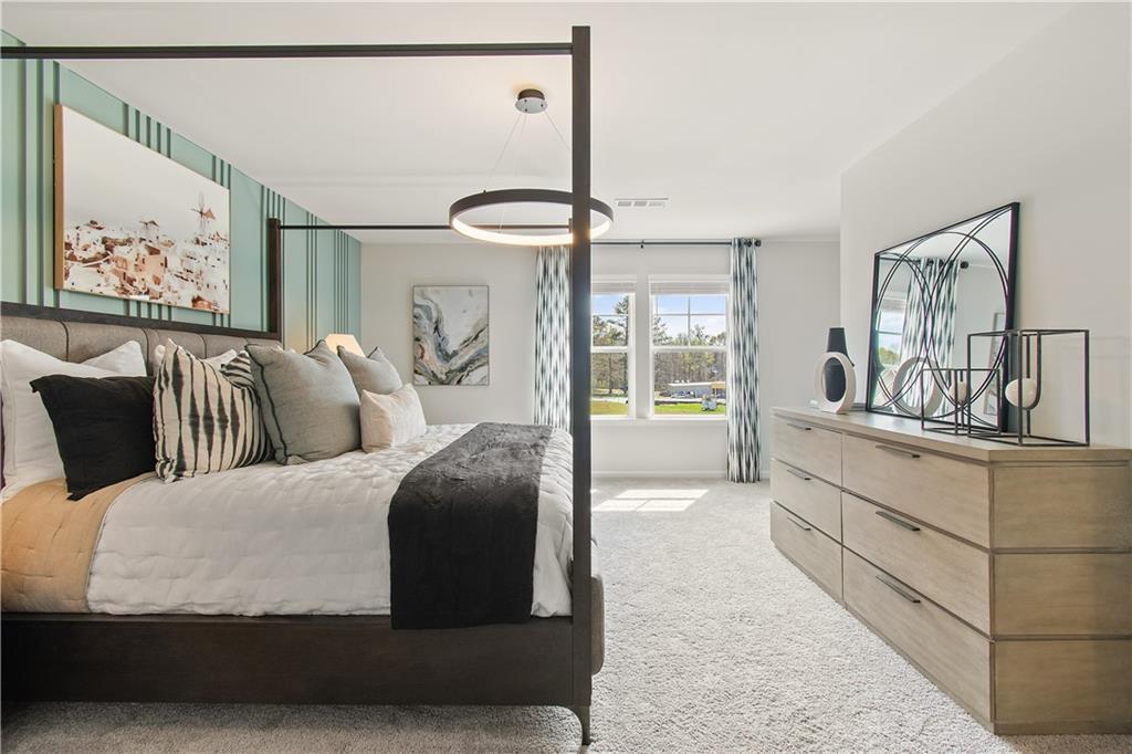 109 Zircon Lane Stockbridge, GA 30281 - Photo 23 of 32 a living room with furniture and a painting on the wall
