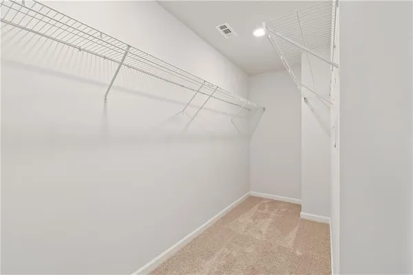 a view of a room with racks on the wall