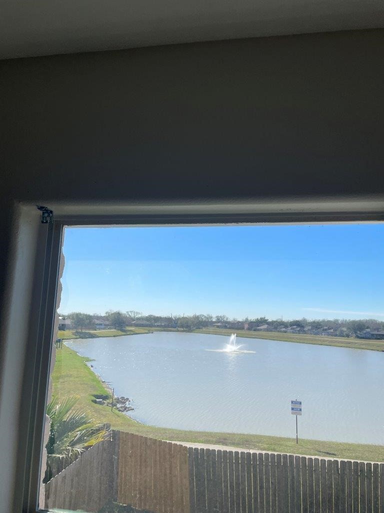 12704 Rio Nueces Lane Rosharon, TX 77583 - Photo 16 of 41 a view of a lake from a balcony
